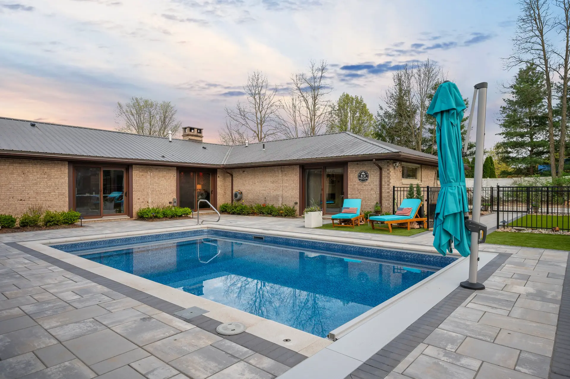 Louvered Pergola and Custom Paver Patio