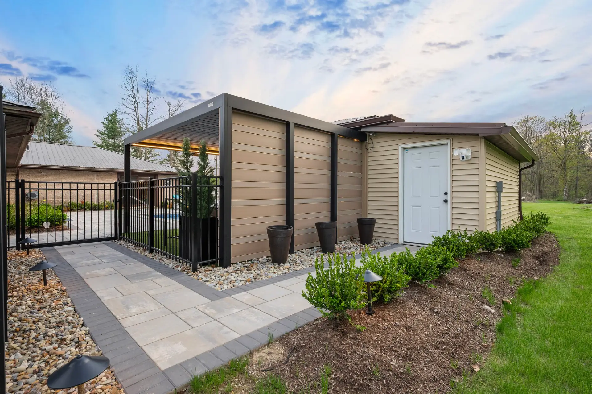 Louvered Pergola and Custom Paver Patio