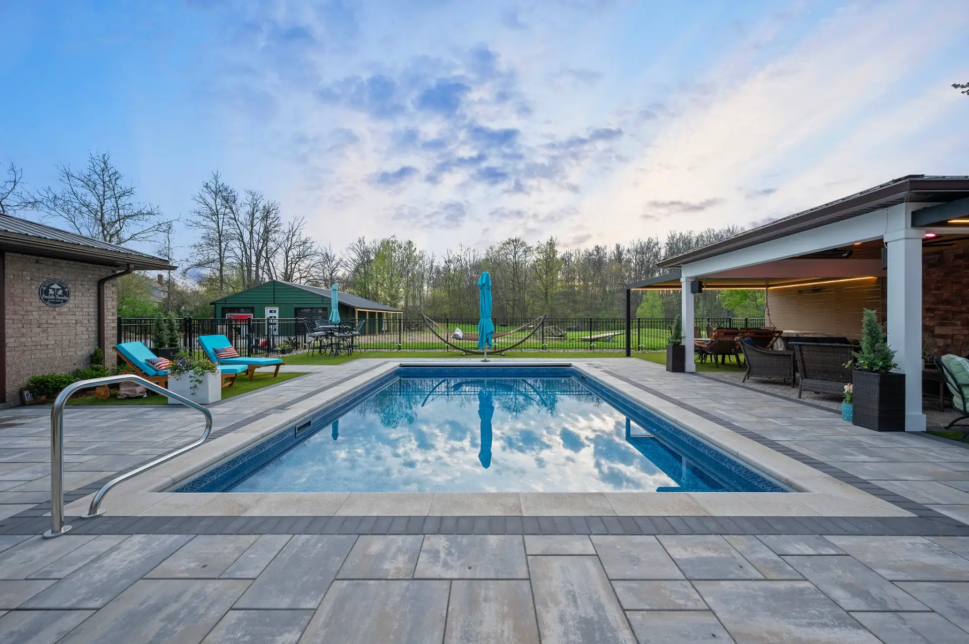 Louvered Pergola and Custom Paver Patio