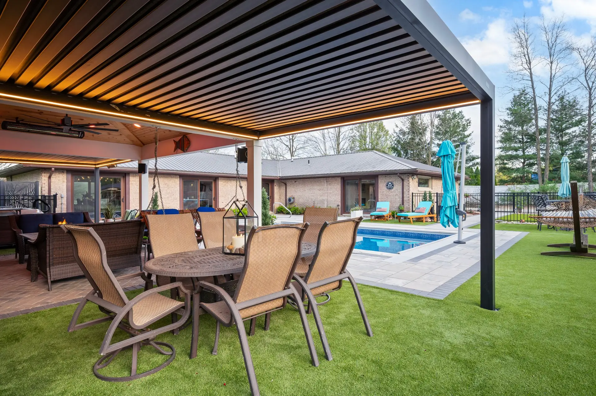 Louvered Pergola and Custom Paver Patio