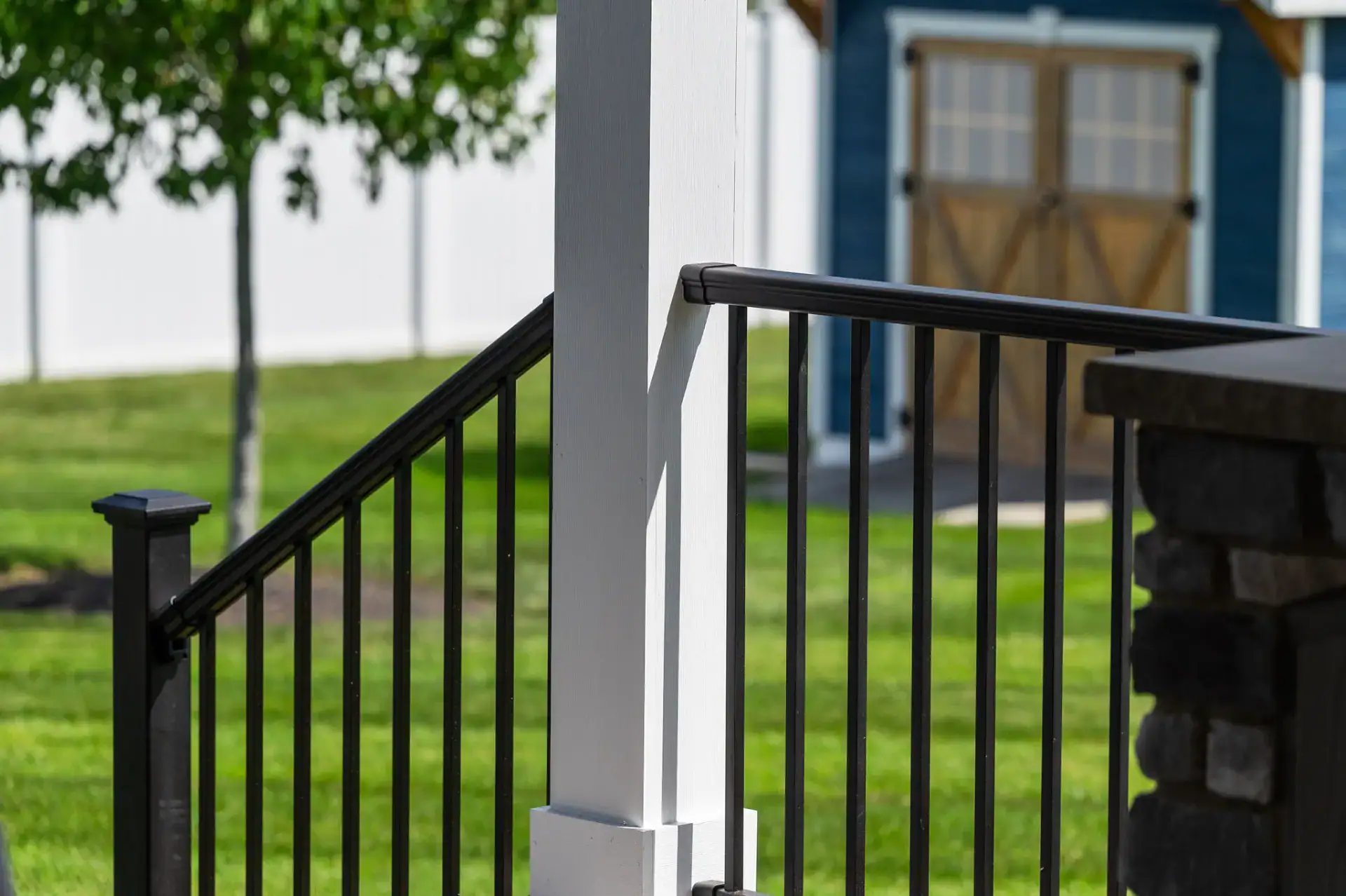 Black aluminum deck railing and post detail in Medina, Ohio by TAB Property Enhancement