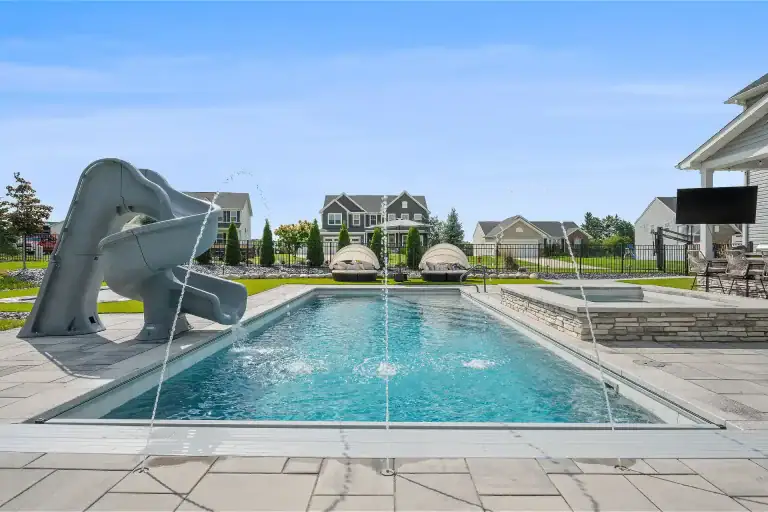Paver Pool Deck with Outdoor Kitchen and Turf in Medina