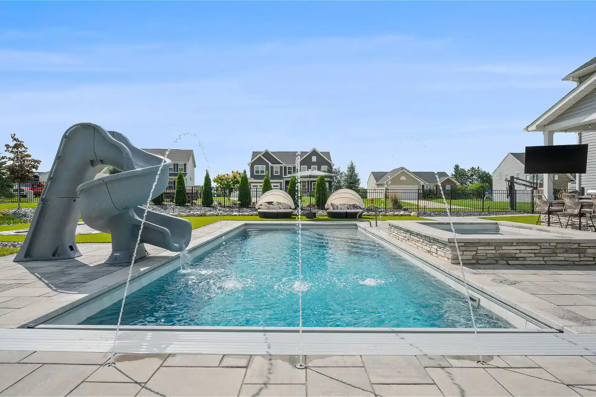 Paver Pool Deck with Outdoor Kitchen and Turf in Medina