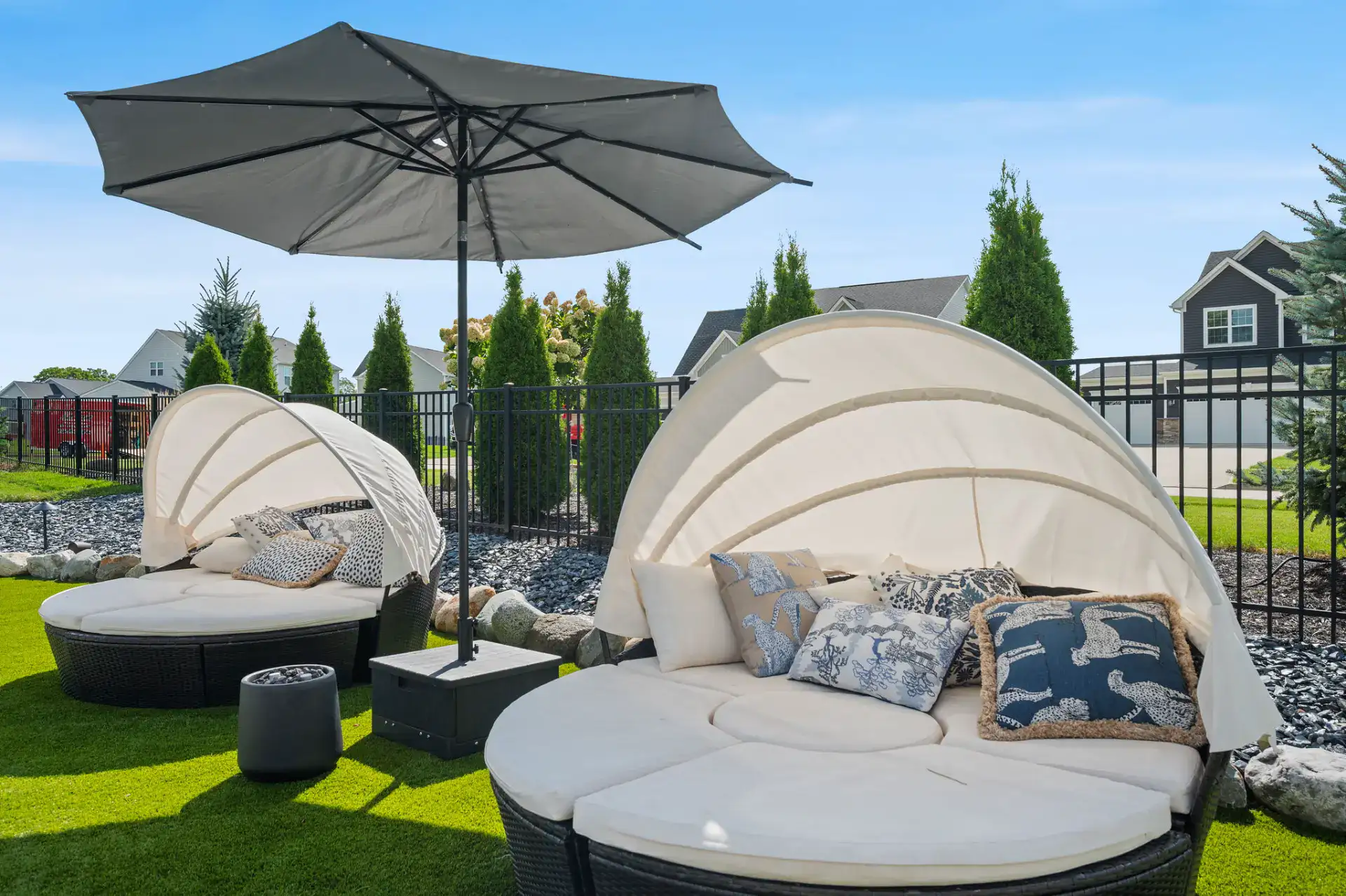 Artificial turf lounge area with daybeds in Medina, Ohio by TAB Property Enhancement