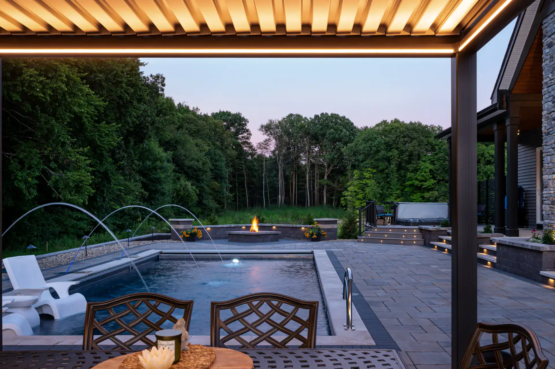 Lit paver steps and raised planter walls in Hinckley, Ohio by TAB Property Enhancement