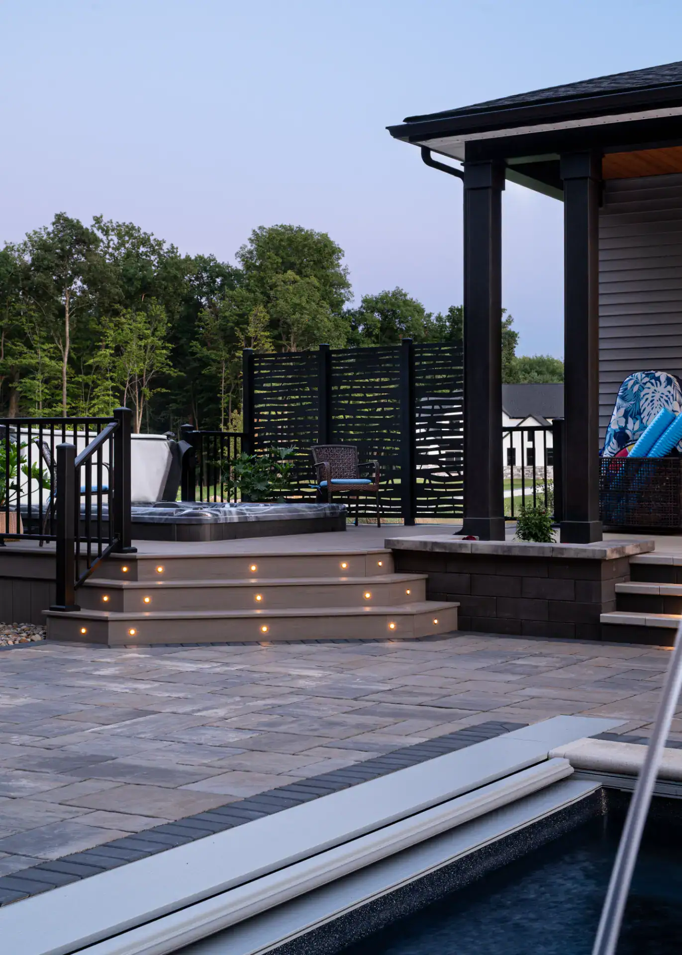 Composite deck with aluminum railing and privacy screens in Hinckley, Ohio by TAB Property Enhancement